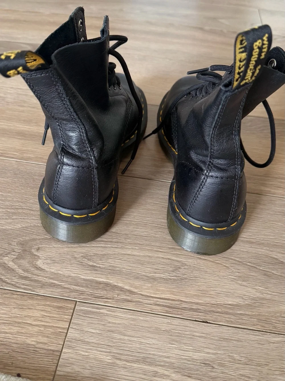 Dr. Martens Black Leather 8-Eye Lace-Up Boots with Yellow Stitching